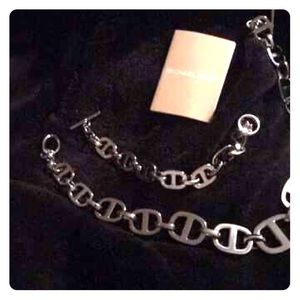 Michael Kors (MK) silver necklace and bracelet.